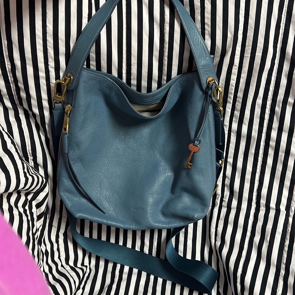 Fossil double strapped soft blue crossbody or shoulder bag with brass hardware.